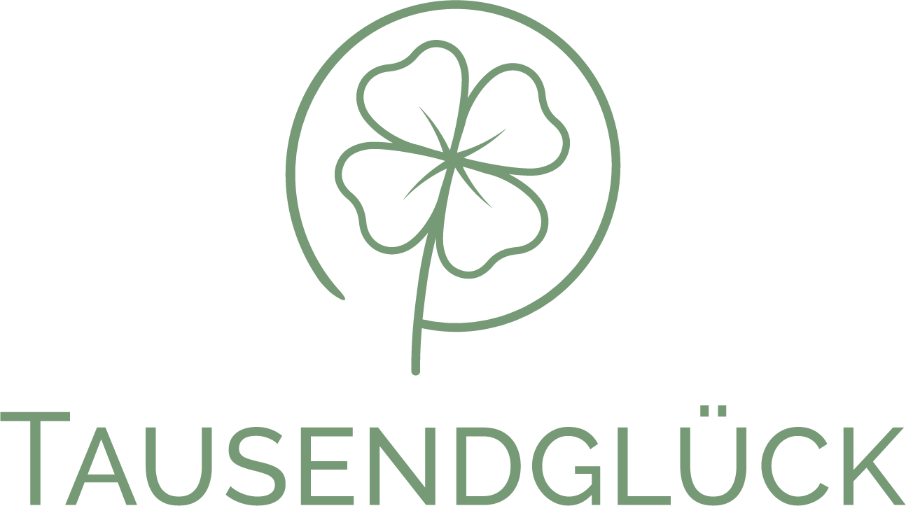 Logo Tausendglück, Kleeblatt im Kreis